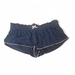 Edikted Alice Gathered navy Blue Shorts with Pink Trim. Side small.